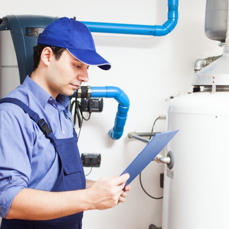 Technician servicing a hot water heater in Sparks, Nevada