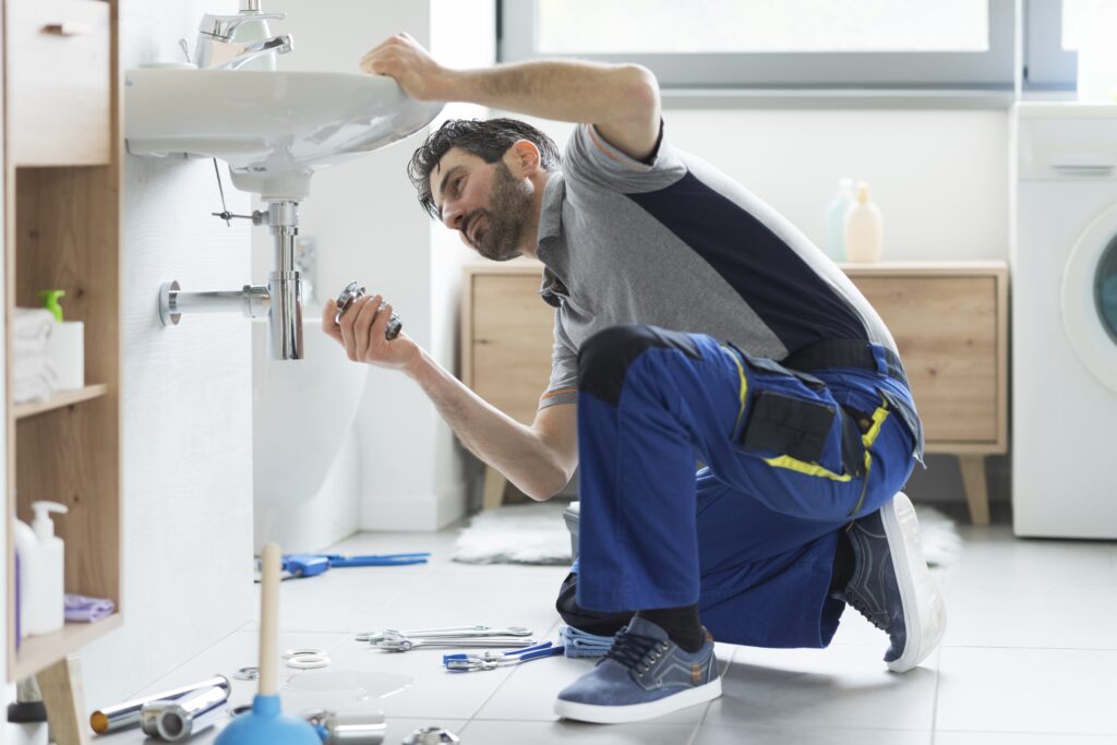 Plumber repairing a faucet in Reno, Nevada